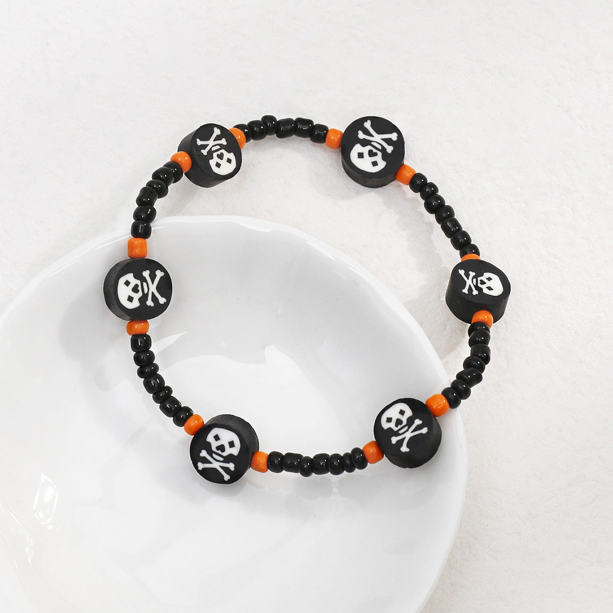 Wholesale Halloween Skeleton Bones, Soft Pottery, Rice Beads, Beaded Bracelets